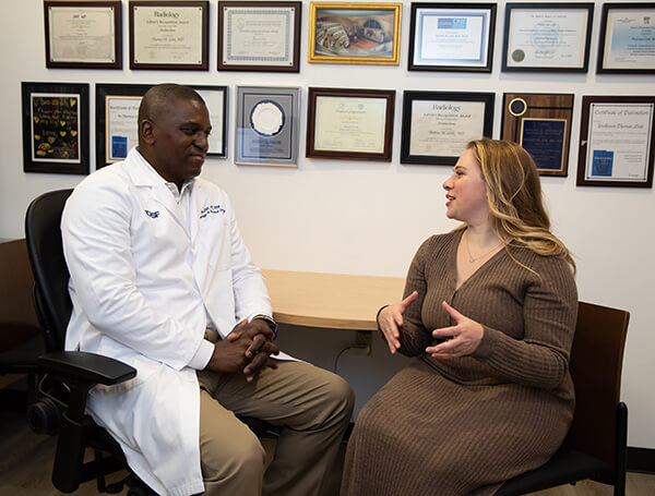 Dr. Kevin McGill and Patient Maryana Kessel - Office Talking