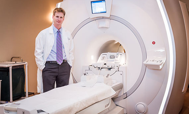 Dr. Thomas Hope with PET/MRI Scanner